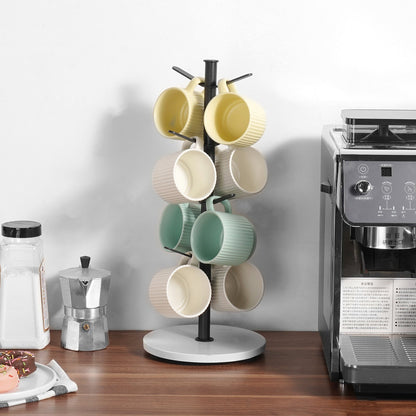 Keep your favorite mugs beautifully displayed and within reach with the Marble Base Mug Tree Holder. Designed with a sleek matte black finish and a luxurious real marble base, this stand blends modern style with everyday functionality — a perfect addition to any kitchen, coffee nook, or office break area.

⸻

✨ Key Features
	•	🏛️ Premium Marble Base: The solid marble base adds a touch of elegance and ensures superior stability — no tipping or wobbling.
	•	☕ Holds Up to 6 Mugs: Sturdy branches provide secur